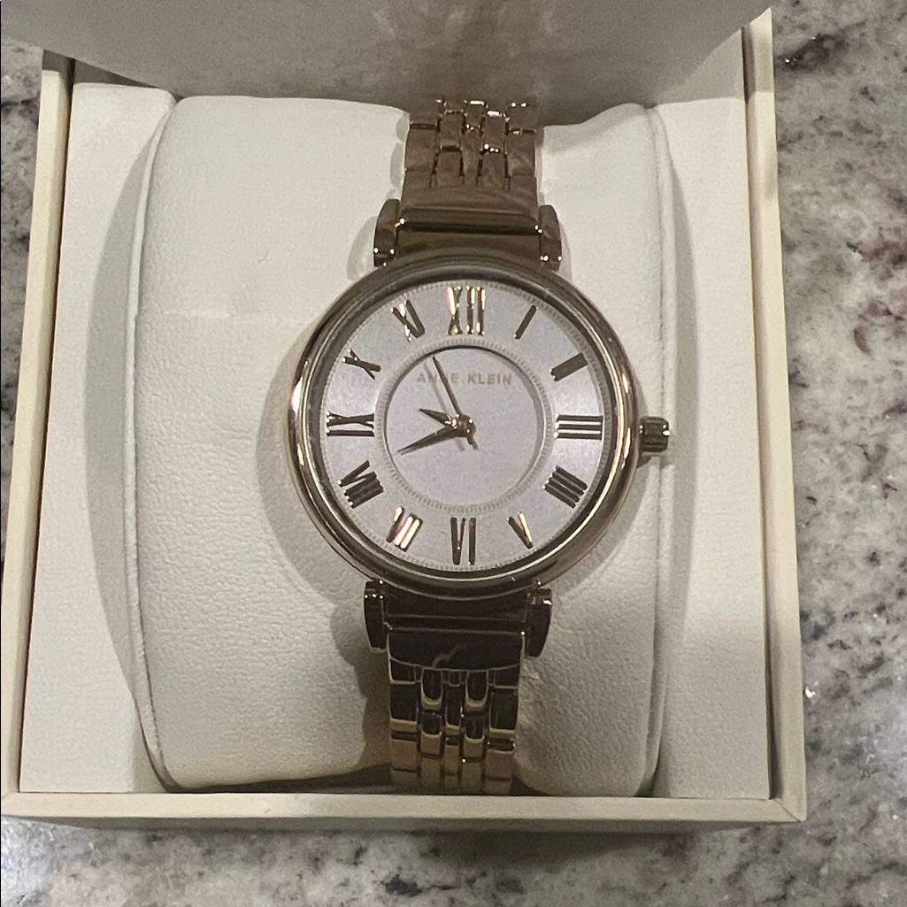 Anne Klein Gold And White Roman Numeral Watch Anne Klein Gold And White Roman Numeral Watch
